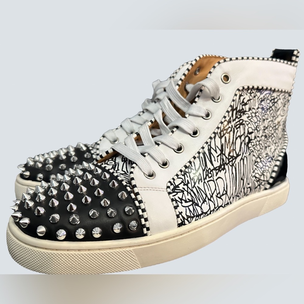 Louis Vuitton Mens high top sneakers studded. Hardly worn almost new. No box.